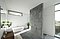 Stort badeværelse med betonvæg og god kontakt med naturen i nybygget hus af arkitekt Jakob Brandt